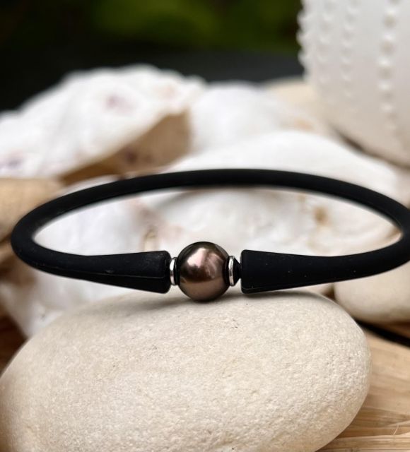 Bijou en perle de Tahiti aux reflets rares et lustre exceptionnel. Certificat d’authenticité et livraison sécurisée – Poemotu.