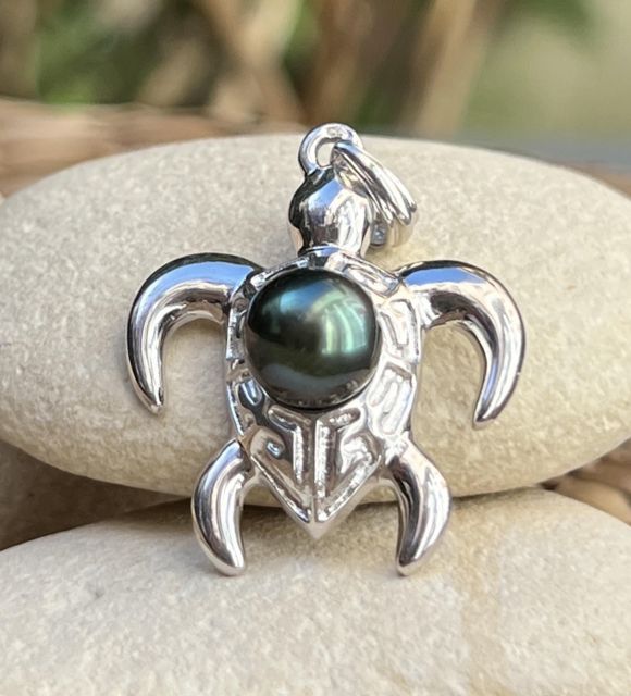 Bijou en perle de Tahiti aux reflets rares et lustre exceptionnel. Certificat d’authenticité et livraison sécurisée – Poemotu.