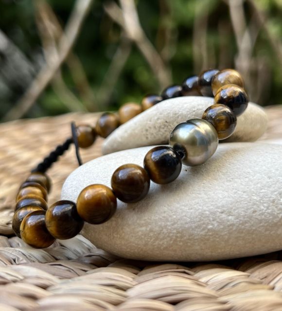 Bijou en perle de Tahiti aux reflets rares et lustre exceptionnel. Certificat d’authenticité et livraison sécurisée – Poemotu.