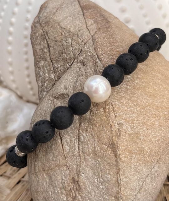 Bijou en perle de Tahiti aux reflets rares et lustre exceptionnel. Certificat d’authenticité et livraison sécurisée – Poemotu.
