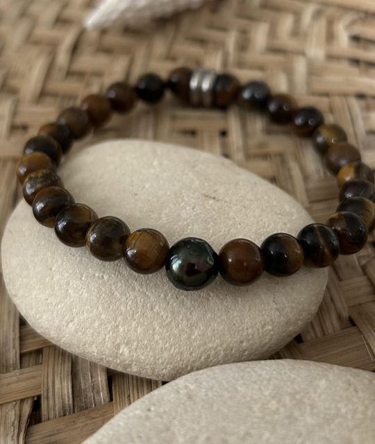Bijou en perle de Tahiti aux reflets rares et lustre exceptionnel. Certificat d’authenticité et livraison sécurisée – Poemotu.