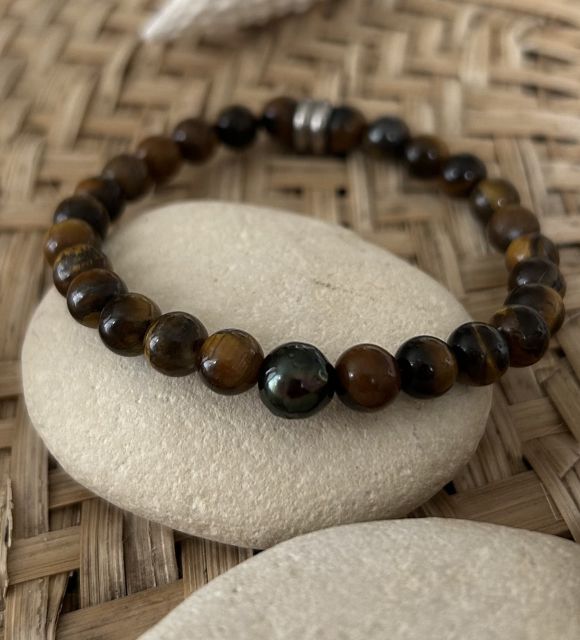 Bijou en perle de Tahiti aux reflets rares et lustre exceptionnel. Certificat d’authenticité et livraison sécurisée – Poemotu.