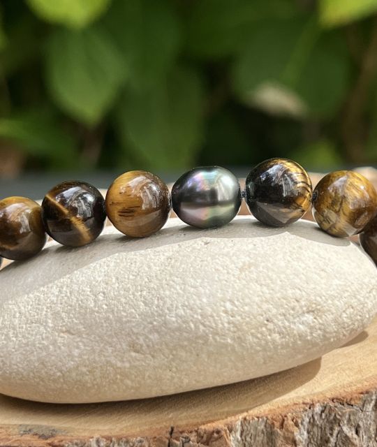 Bijou en perle de Tahiti aux reflets rares et lustre exceptionnel. Certificat d’authenticité et livraison sécurisée – Poemotu.