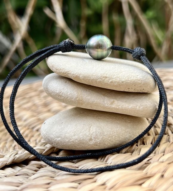 Sa teinte Pink Pacific Sunset, mêlant des reflets rosés, cuivrés et lilas, évoque la lumière du ciel polynésien au crépuscule - certifié et garanti