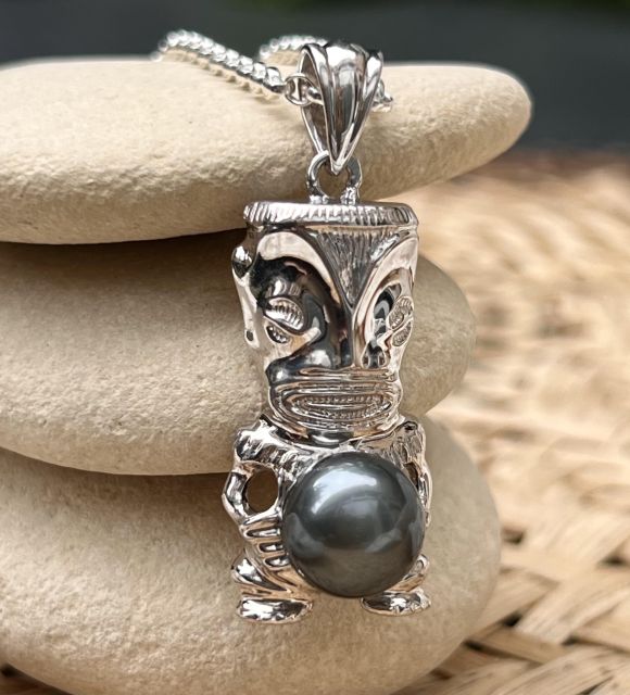 Joya en perla de Tahití con reflejos raros y brillo excepcional. Certificado de autenticidad y entrega segura – Poemotu.