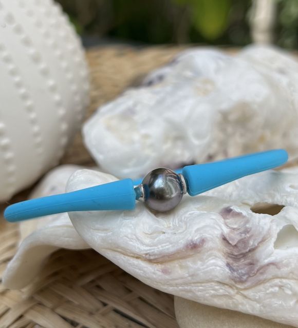 Bijou en perle de Tahiti aux reflets rares et lustre exceptionnel. Certificat d’authenticité et livraison sécurisée – Poemotu.