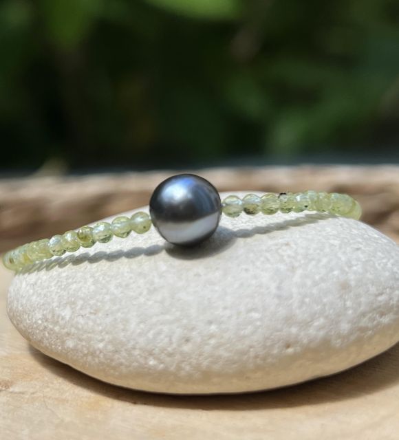 Bijou en perle de Tahiti aux reflets rares et lustre exceptionnel. Certificat d’authenticité et livraison sécurisée – Poemotu.