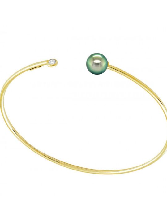 Étoile, ce bracelet magnifique se pare d'une perle rare de Tahiti 9/10mm, un diamant naturel blanc étincelle l'ensemble pour un éclat inoubliable