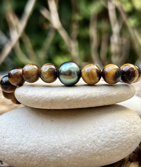 Bijou en perle de Tahiti aux reflets rares et lustre exceptionnel. Certificat d’authenticité et livraison sécurisée – Poemotu.