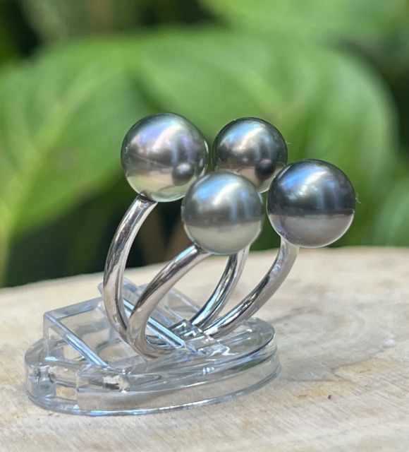 Joya en perla de Tahití con reflejos raros y brillo excepcional. Certificado de autenticidad y entrega segura – Poemotu.