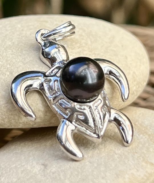 Bijou en perle de Tahiti aux reflets rares et lustre exceptionnel. Certificat d’authenticité et livraison sécurisée – Poemotu