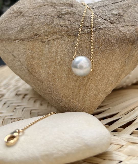 Bijou en perle de Tahiti aux reflets rares et lustre exceptionnel. Certificat d’authenticité et livraison sécurisée – Poemotu.