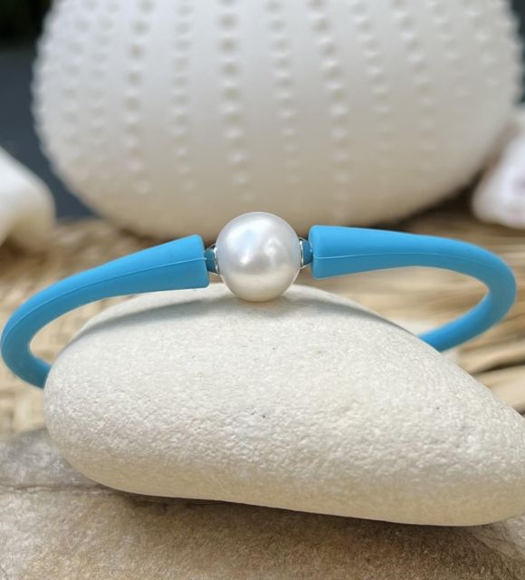 Bijou en perle de Tahiti aux reflets rares et lustre exceptionnel. Certificat d’authenticité et livraison sécurisée – Poemotu.