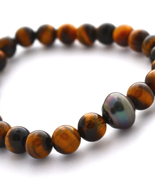 Bijou en perle de Tahiti aux reflets rares et lustre exceptionnel. Certificat d’authenticité et livraison sécurisée – Poemotu.