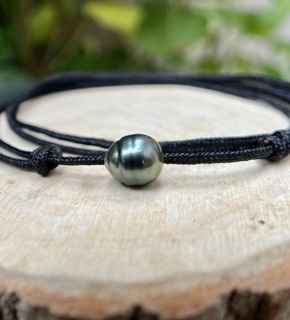Bijou en perle de Tahiti aux reflets rares et lustre exceptionnel. Certificat d’authenticité et livraison sécurisée – Poemotu.