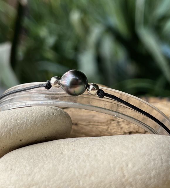 Découvrez cette subtile et rare véritable perle de Tahiti de couleur peacock au reflet bleu - certificat garantie et origine de la perle - livraison gratuite