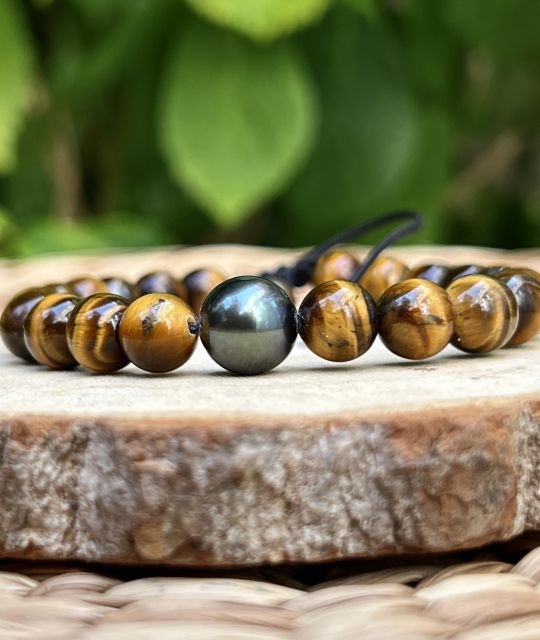 Bijou en perle de Tahiti aux reflets rares et lustre exceptionnel. Certificat d’authenticité et livraison sécurisée – Poemotu.