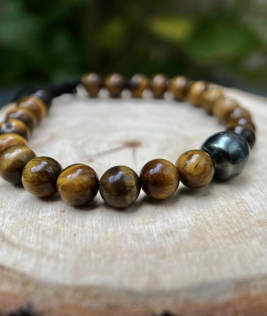 Bijou en perle de Tahiti aux reflets rares et lustre exceptionnel. Certificat d’authenticité et livraison sécurisée – Poemotu.