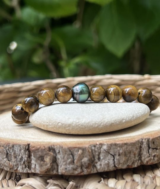 Bijou en perle de Tahiti aux reflets rares et lustre exceptionnel. Certificat d’authenticité et livraison sécurisée – Poemotu.