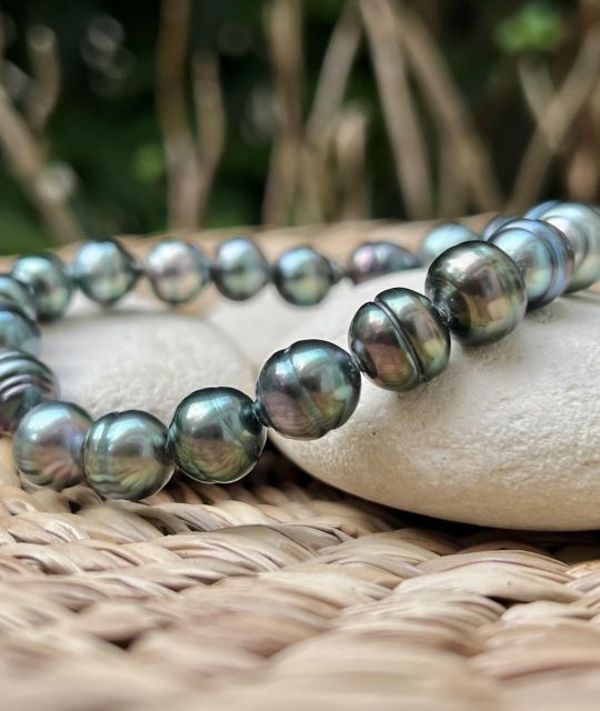 Bijou en perle de Tahiti aux reflets rares et lustre exceptionnel. Certificat d’authenticité et livraison sécurisée – Poemotu.