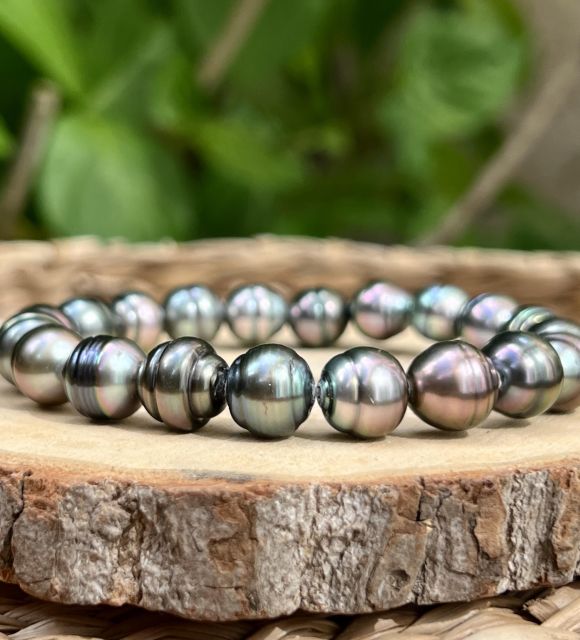 Bijou en perle de Tahiti aux reflets rares et lustre exceptionnel. Certificat d’authenticité et livraison sécurisée – Poemotu.