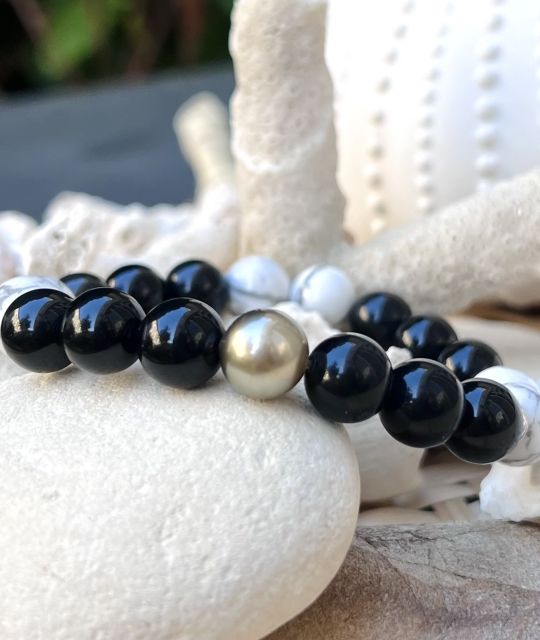 Bijou en perle de Tahiti aux reflets rares et lustre exceptionnel. Certificat d’authenticité et livraison sécurisée – Poemotu.