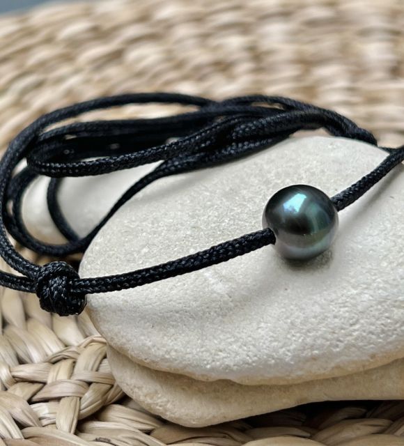 Bijou en perle de Tahiti aux reflets rares et lustre exceptionnel. Certificat d’authenticité et livraison sécurisée – Poemotu.