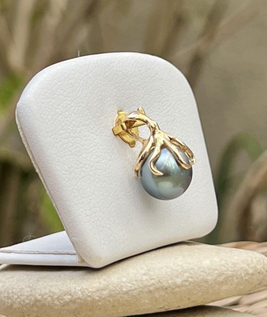 Bijou en perle de Tahiti aux reflets rares et lustre exceptionnel. Certificat d’authenticité et livraison sécurisée – Poemotu.