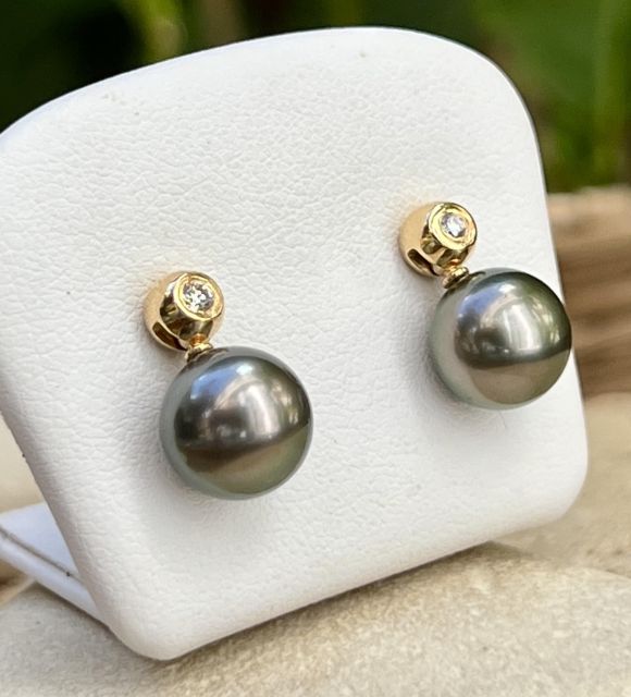 Joya en perla de Tahití con reflejos raros y brillo excepcional. Certificado de autenticidad y entrega segura – Poemotu.