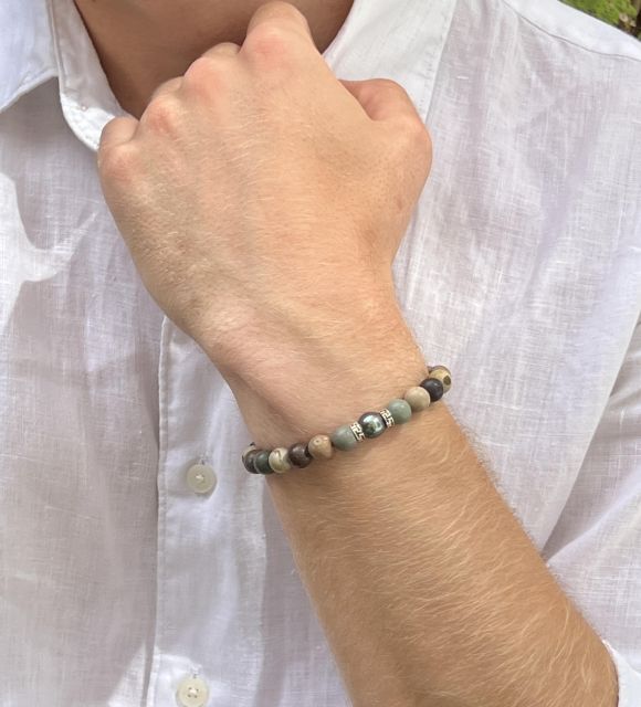 Bijou en perle de Tahiti aux reflets rares et lustre exceptionnel. Certificat d’authenticité et livraison sécurisée – Poemotu.