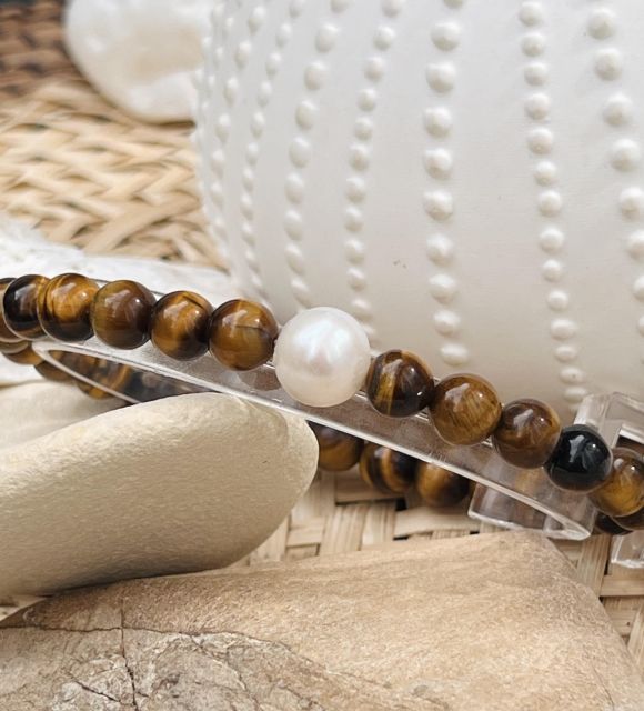 Bijou en perle de Tahiti aux reflets rares et lustre exceptionnel. Certificat d’authenticité et livraison sécurisée – Poemotu.