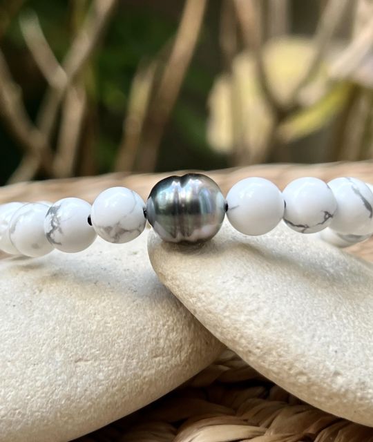 Bijou en perle de Tahiti aux reflets rares et lustre exceptionnel. Certificat d’authenticité et livraison sécurisée – Poemotu.