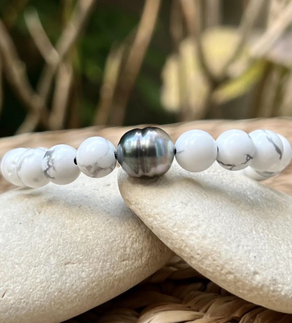 Bijou en perle de Tahiti aux reflets rares et lustre exceptionnel. Certificat d’authenticité et livraison sécurisée – Poemotu.