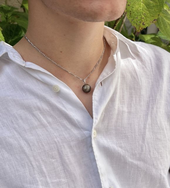 Bijou en perle de Tahiti aux reflets rares et lustre exceptionnel. Certificat d’authenticité et livraison sécurisée – Poemotu.