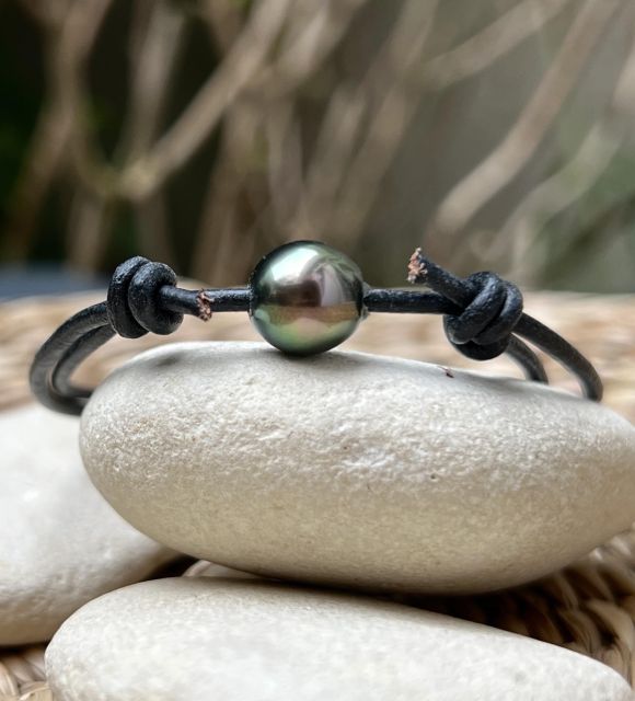 Bijou en perle de Tahiti aux reflets rares et lustre exceptionnel. Certificat d’authenticité et livraison sécurisée – Poemotu.
