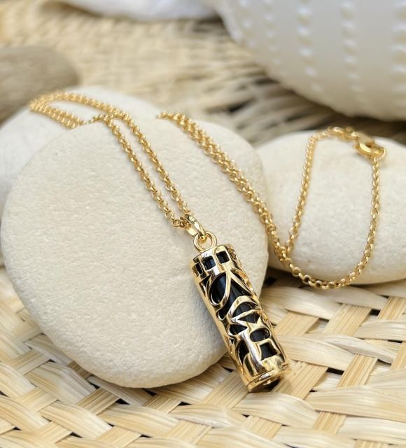 Bijou en perle de Tahiti aux reflets rares et lustre exceptionnel. Certificat d’authenticité et livraison sécurisée – Poemotu.