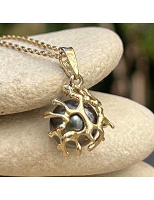 quels sont les bienfaits du corail ? pendentif or perle de Tahiti bleu