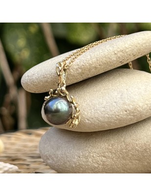 What are the benefits of coral ? Tahitian pearl gold pendant for man - tahitian jewel