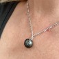 Ciondolo in perla di Tahiti con incisione dello zodiaco dei Pesci
