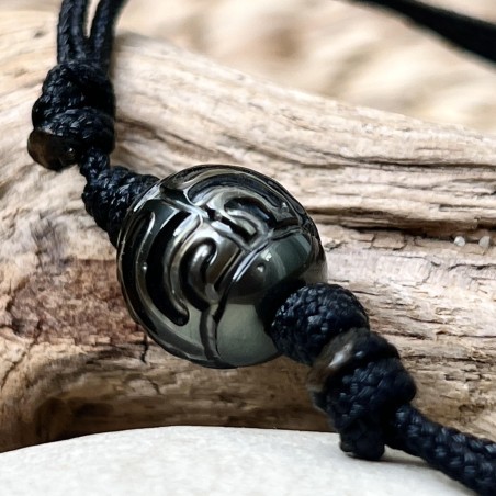 quel est le symbole des Maori? collier homme perle noire de Tahiti gravée prix