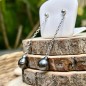 Dos perlas de Tahití en pendientes colgantes