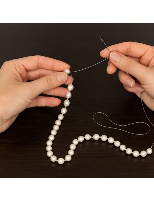 Infilatura di una Collana di Perle Coltivate
