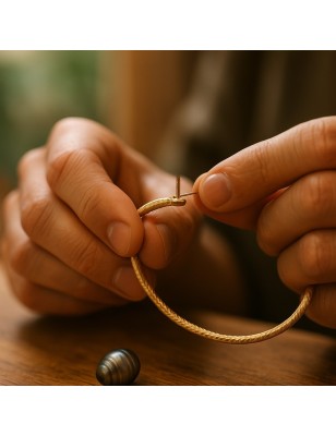 atelier pour ressouder une tige sur une bague avec une perle