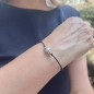 Heiata – Schwarzes Satinarmband mit schillernder weißer Tahitiperle