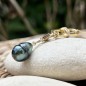 Nai'a - Pulsera de plata y oro con perla de Tahití azul verdosa