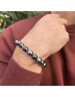 Veintiún perlas de pavo real de Tahití en una pulsera unisex