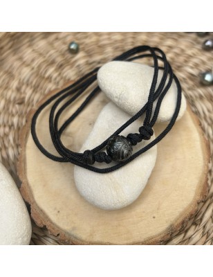 quel est le symbole des Maori? collier homme perle noire de Tahiti gravée prix