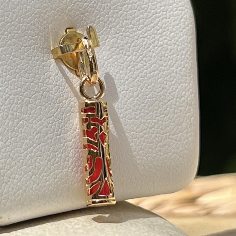Kraft – Tiki – Gelbvergoldet – Korallenfarbe Kraft – Tiki – Gelbvergoldet – Korallenfarbe
